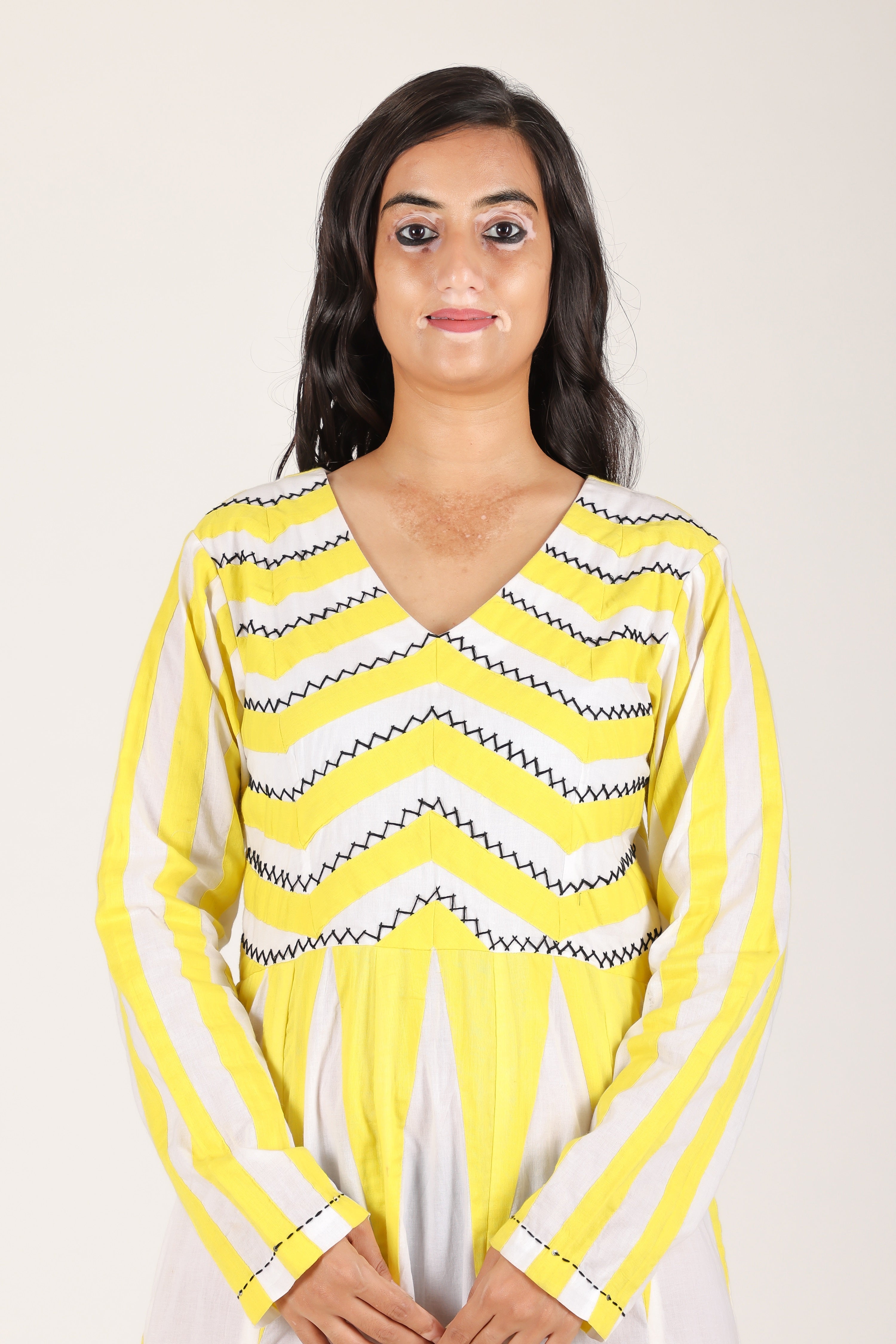 Yellow zig zag applique hand work dress